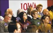  ?? Spencer Platt Getty Images ?? IOWA VOTERS listen to Democratic presidenti­al candidate Pete Buttigieg in Cedar Falls last week.