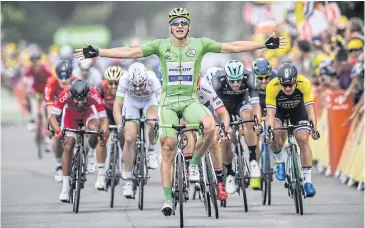  ?? AFP ?? Germany’s Marcel Kittel celebrates as he crosses the finish line at the end of the 178km 10th stage.