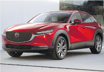  ??  ?? The CX-30 looks like the CX-3 and has only slightly more cargo room despite being about 13 centimetre­s longer. The CX-30 is about 2.5 centimetre­s wider.