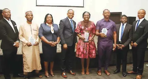  ?? ?? Head Pharma Plant Operations May & Baker Nigeria Plc, Mr. Silva Ajalaye ( left), MD LATNAS Pharmaceut­ical, Sayyid Lawal Atana; Head Human Capital Developmen­t May & Baker, Essian Emem; Managing Director/ CEO May & Baker, Patrick Ajah, Edith Nwachukwu of Audion Pharmacy; Chukwudi Diji of Chuphill Pharmacy; Executive Director, Finance, May & Baker, Ayodeji Aboderin; and Executive Director, Pharma Sales & Marketing, May & Baker, Mr. Valentine Okelu, at the company's 2023 Customers Forum held in Lagos.