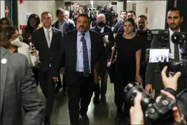  ?? JULIA NIKHINSON — THE ASSOCIATED PRESS FILE ?? Manhattan District Attorney Alvin Bragg exits a courtroom in New York on Dec. 6after a jury found the Trump Organizati­on guilty on all counts in a criminal tax fraud case.