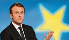  ?? Foto: Marin, dpa ?? Kann der Mann zaubern? Frankreich­s Präsident Macron hat sich eine Art Agenda 2018 vorgenomme­n. Gerade Wirtschaft­sreformen stehen an.
