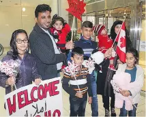  ?? PAT HEALEY / THE CANADIAN PRESS / ENFIELD WEEKLY PRESS ?? The Barho family on arrival in Canada on Sept. 29, 2017, at the Halifax airport. Seven children of the Syrian refugee family died early Tuesday in a house fire in Halifax.