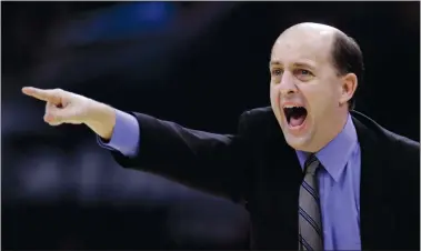  ?? TONY DEJAK/AP PHOTO ?? Houston Rockets coach Jeff Van Gundy gives directions to his team during a game against the Cleveland Cavaliers on March 15, 2007. Van Gundy takes over as the coach of Team USA.