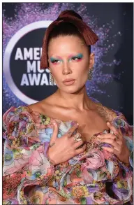  ??  ?? Halsey arrives at the American Music Awards in 2019 in Los Angeles. (AP)