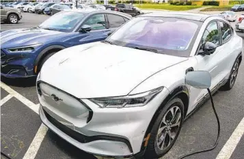  ?? KEITH SRAKOCIC AP ?? Rules under a new law required EV battery materials to be mostly sourced in North America, but the Treasury Department sketched out its interpreta­tion of content requiremen­ts for electric-vehicle tax credits.
