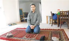  ?? KIM HAIRSTON/BALTIMORE SUN ?? Mansoor Shams, of Pikesville, in his home Sept. 3. The “Muslim Marine” is known for his work as a speaker, writer and ambassador for his faith and the U.S. military.