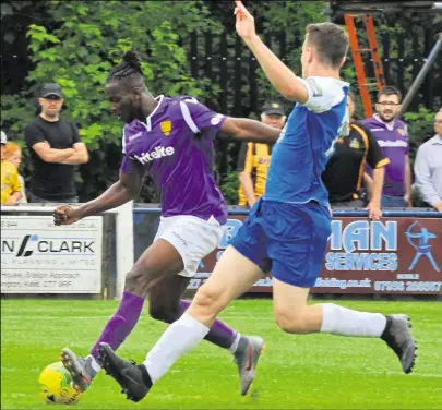  ?? Picture: Steve Terrell ?? Ibrahim Olutade runs at the Herne Bay defence in pre-season