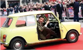  ?? ?? ‘One of the most successful shows in the world’ … Rowan Atkinson in Mr Bean’s yellow Mini. Photograph: Imago/Alamy