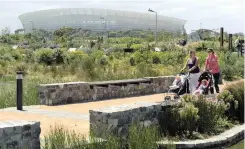  ??  ?? THE CAPE Town Stadium, surrounded by green space, is photograph­ed from the new Greenpoint Urban Park. | Henk Kruger African News Agency (ANA)
