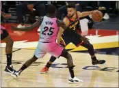  ?? NHAT V. MEYER — BAY AREA NEWS GROUP ?? The Warriors’ Stephen Curry dribbles against the Heat’s Kendrick Nunn at Chase Center on Wednesday.