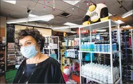  ?? Mel Melcon Los Angeles Times ?? JANET TAVAKOLI faces criminal charges for reopening her Sherman Oaks beauty supply store early. “Are they going to take me to jail?” she said.