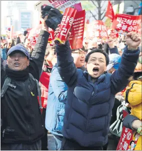  ??  ?? DELIGHTED: Some protesters showed their joy after hearing the Constituti­onal Court’s verdict.