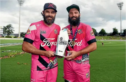  ?? PHOTOSPORT ?? Dean Brownlie, left, and Anton Devcich starred for the Northern Knights in their Super Smash Twenty20 final triumph over the Central Stags at Seddon Park, Hamilton.