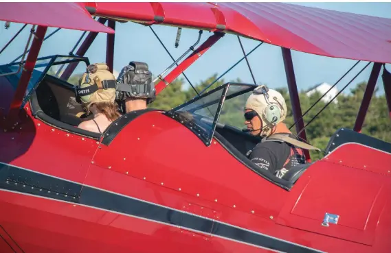  ??  ?? Above: The two-place front seat of a WACO UPF-7 is perfect for making memories.