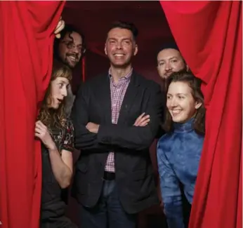  ?? COLE BURSTON PHOTOS FOR TORONTO STAR ?? Stephen Altena, co-curator of $100 Gallery, is flanked by members of Casino Artspace, from left, Steph Jacobs, Gabriel Baribeau, Mark Preston and Aimee Burnett at Casino Artspace in Hamilton.