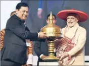  ?? PTI PHOTO ?? Assam chief minister Sarbananda Sonowal (left) felicitate­s Prime Minister Narendra Modi in Guwahati on Saturday.