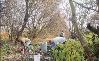  ?? COURTESY PHOTOGRAPH­S ?? Members of Take Back Lodi clean up a homeless encampment in Lodi in December 2017. The group, created by Lodi Grape Festival Director Mark Armstrong, has held several similar clean-up events since it was formed in August 2017.