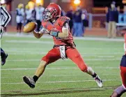  ?? [PHOTO BY SARAH PHIPPS, THE OKLAHOMAN] ?? Carl Albert’s Ben Harris pitches the ball for a touchdown earlier in the playoffs.