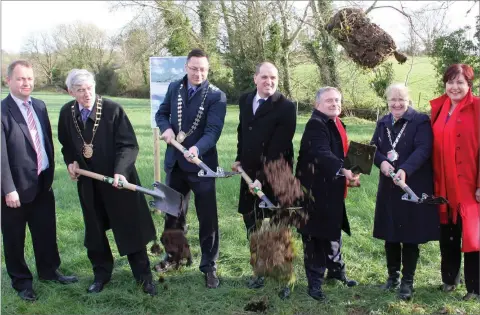  ??  ?? A New Ross man was charged with threatenin­g and abusive behaviour at the sod turning ceremony last February (pictured above) at Camblin for the New Ross bypass.