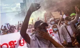  ?? Photograph: AFP/Getty Images ?? Protesters take part in a demonstrat­ion against the military coup in Yangon, Myanmar, on 3 July 2021.