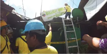  ??  ?? Members of the Cebu City demolition team dismantle one of the tanod outposts in Barangay Ermita last week. More outposts will be demolished soon after Barangay Captain Imok Rupinta failed to get reconsider­ation from Mayor Tomas Osmeña.