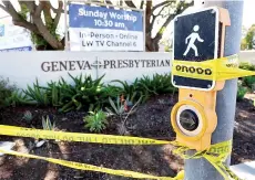  ?? — AFP photo ?? Police tape blocks off the scene of a shooting at the Geneva Presbyteri­an Church in Laguna Woods, California.