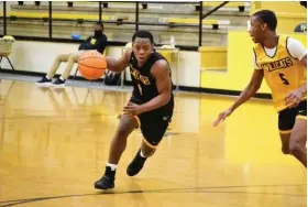  ?? Bluff Commercial/I.C. Murrell) (Pine ?? Watson Chapel sophomore Keshun Brown (left) and senior Thurman Shaw practice on campus Jan. 27.