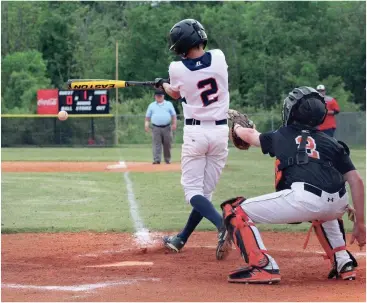  ??  ?? Heritage leadoff hitter Cade Kiniry turns on the first pitch of Game 1 of the semifinals against LaFayette last Wednesday. The Generals went on to sweep the series. (Messenger photo/Scott Herpst)