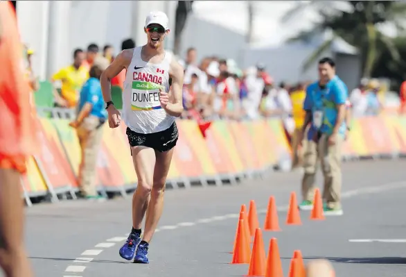  ?? ROBERT F. BUKATY/THE ASSOCIATED PRESS FILES ?? Evan Dunfee, who finished fourth in the men’s 50-km race walk at the 2016 Olympics in Rio, will be walking the Vancouver Sun Run.