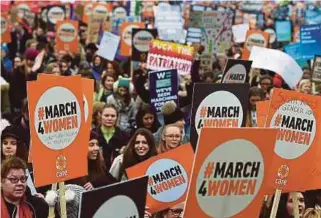  ?? EPA PIC ?? Thousands of women march past the Parliament during a ‘March for Women’ event in London, ahead of the Internatio­nal Women’s Day (IWD), calling for gender equality. IWD is celebrated annually on March 8.