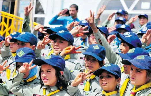  ?? PHOTOS: USAF TECHNICAL SERGEANT JOE PROUSE ?? Afghan Scouts meetings typically involve learning practical skills, such as emergency survival training. On one special day last June, the children took part in a space derby.