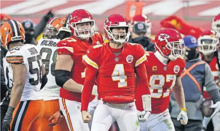  ??  ?? Chiefs quarterbac­k Chad Henne celebrates after a run late in the second half of a 22-17 win over the Browns on Sunday at Arrowhead Stadium in Kansas City. Henne replaced starter Patrick Mahomes, who suffered a concussion. [AP PHOTO/CHARLIE RIEDEL]