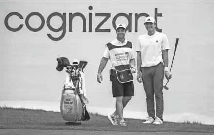  ?? GREG LOVETT/THE PALM BEACH POST ?? Golfer Nick Dunlap laughs with caddie Hunter Hamrick on the ninth hole during Friday’s second round of the Cognizant Classic in the Palm Beaches at PGA National in Palm Beach Gardens.