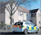  ??  ?? CRIME: Police outside the house in Thornton, Fife, where two-year-old Liam Fee died in 2014.