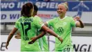  ??  ?? Pia-Sophie Wolter and Shanice van de Sanden celebrate a Wolfsburg goal