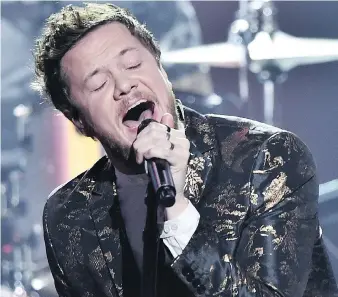  ?? GETTY IMAGES ?? Singing outdoors in the cold is “really brutal,” says Dan Reynolds of Imagine Dragons.