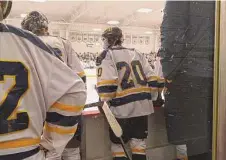  ?? Michael Fornabaio/Hearst Connecticu­t Media ?? Colin Goguen wears friend Marcus Rogers' No. 20 sweater on Saturday in a game for Housatonic boys hockey against Tri-Town at South Kent. Rogers died along with his grandfathe­r in an accident on Jan. 31.