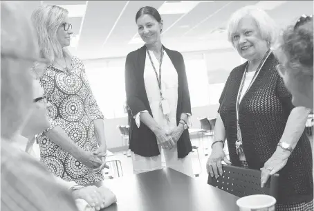  ?? DAX MELMER ?? Linda Nagle, left, chair of the Mental Health Connection­s board of directors, Charlene Brockleban­k, program manager, and Jean Laforge, executive director, chat with visitors during an open house at the new Windsor Essex Community Health Centre in...