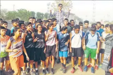  ?? HT PHOTO ?? Naveen, who scored 491 marks out of 500, celebratin­g his success with friends and classmates after the declaratio­n of board results, in Hisar on Thursday.