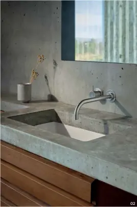  ?? ?? 01 VOLA’s classic HV1 tap is known for its concise and cylindrica­l body. 02 02 The one-handle wall-mounted VOLA 111 mixer, shown in ‘Colour 40 – Brushed Stainless Steel.’