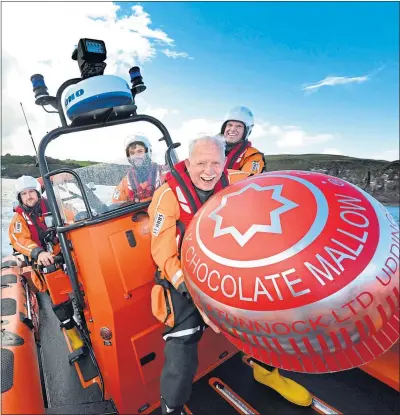  ?? Picture
Angus Blackburn/scottish Field ?? Sir Boyd Tunnock and crew aboard St Abbs Lifeboat