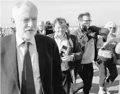  ??  ?? Corbyn leaves a temporary television studio after appearing on the BBC’s Andrew Marr Show, in Brighton. — Reuters photo