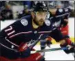  ?? JAY LAPRETE — THE ASSOCIATED PRESS FILE ?? Columbus Nick Foligno chases the puck against Lightning. the