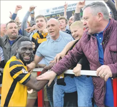  ?? Picture: Gary Browne FM4339362 Buy this picture from kentonline.co.uk ?? Manny Parry with Maidstone fans after they beat Ebbsfleet in the play-off final