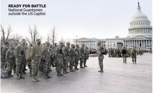  ?? ?? READY FOR BATTLE National Guardsmen outside the US Capitol