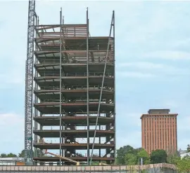  ?? WILLIAM BRETZGER/DELAWARE NEWS JOURNAL ?? The Tower at Avenue North had nearly reached its full height in late August 2023 as constructi­on on the 12-story office structure along Concord Pike continued. It will join the Wells Fargo Tower as two standouts standing above the suburban skyline looking down on the taller buildings of downtown Wilmington.