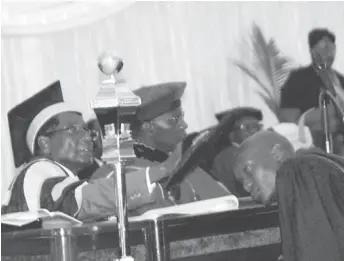  ??  ?? Sunday News correspond­ent Meluleki Moyo being capped by President Mugabe during the Midlands State University graduation ceremony on Friday for attaining at Master of Science Degree in Media and Society Studies