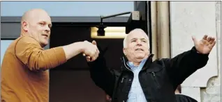  ??  ?? Getty Images files Samuel “Joe the Plumber” Wurzelbach­er, left, shown with Republican presidenti­al nominee Sen. John Mccain in 2008, is running for the Republican­s in Ohio’s 9th Congressio­nal District.