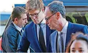  ?? [AP PHOTO] ?? Alex van der Zwaan, second from left, arrives at Federal District Court in Washington on Tuesday.